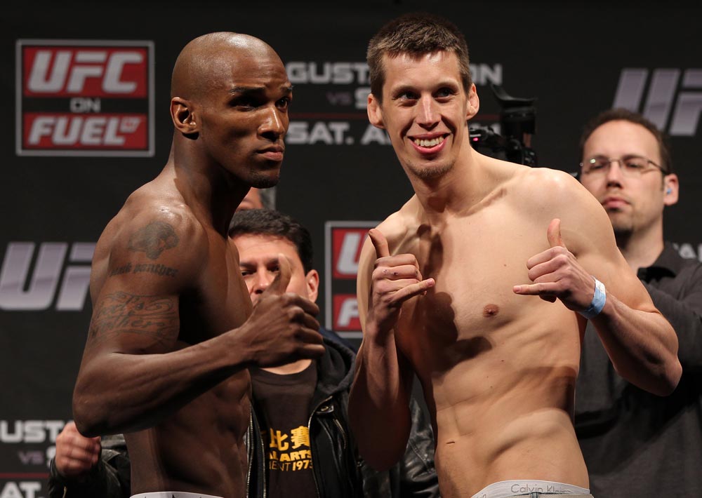 STOCKHOLM, SWEDEN - APRIL 13: (L-R) Middleweight opponents Francis Carmont and Magnus Cedenblad face off after weighing in during the official UFC on Fuel TV weigh in event at Ericsson Globe on April 13, 2012 in Stockholm, Sweden. (Photo by Josh Hedges/Zuffa LLC/Zuffa LLC via Getty Images)