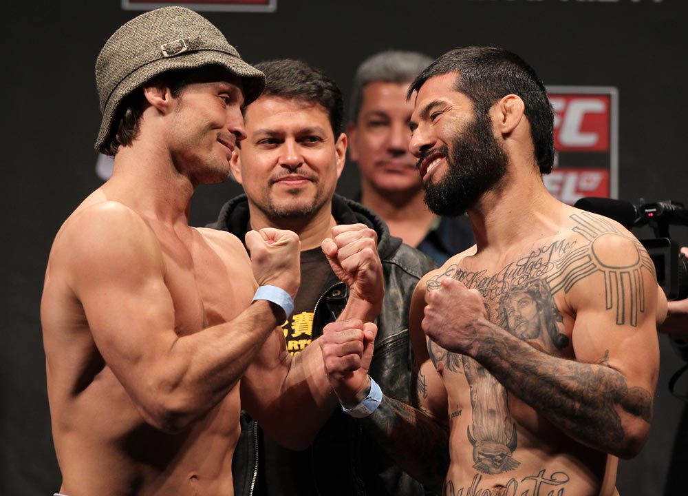 STOCKHOLM, SWEDEN - APRIL 13: (L-R) Bantamweight opponents Brad Pickett and Damacio Page face off after weighing in during the official UFC on Fuel TV weigh in event at Ericsson Globe on April 13, 2012 in Stockholm, Sweden. (Photo by Josh Hedges/Zuffa LLC/Zuffa LLC via Getty Images)