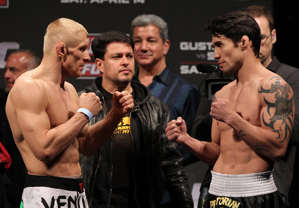 STOCKHOLM, SWEDEN - APRIL 13: (L-R) Featherweight opponents Dennis Siver and Diego Nunes face off after weighing in during the official UFC on Fuel TV weigh in event at Ericsson Globe on April 13, 2012 in Stockholm, Sweden. (Photo by Josh Hedges/Zuffa LLC/Zuffa LLC via Getty Images)