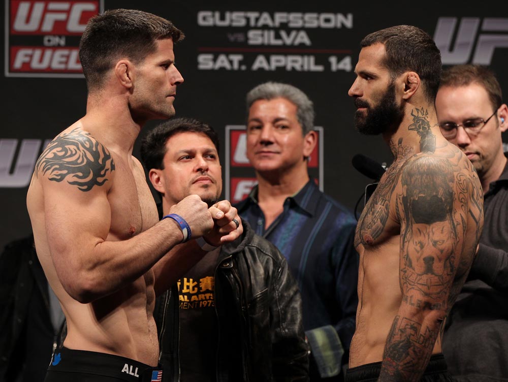 STOCKHOLM, SWEDEN - APRIL 13: (L-R) Middleweight opponents Brian Stann and Alessio Sakara face off after weighing in during the official UFC on Fuel TV weigh in event at Ericsson Globe on April 13, 2012 in Stockholm, Sweden. (Photo by Josh Hedges/Zuffa LLC/Zuffa LLC via Getty Images)
