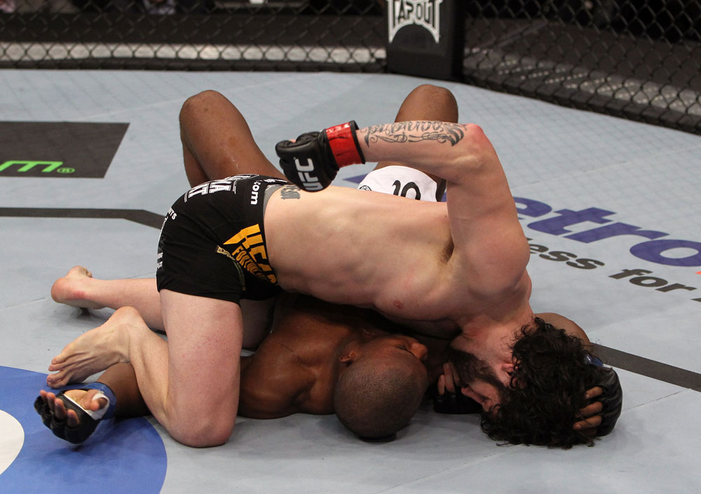 NASHVILLE, TN - JANUARY 20:  (R-L) Charlie Brenneman punches down at Daniel Roberts during the UFC on FX event at Bridgestone Arena on January 20, 2012 in Nashville, Tennessee.  (Photo by Josh Hedges/Zuffa LLC/Zuffa LLC via Getty Images)