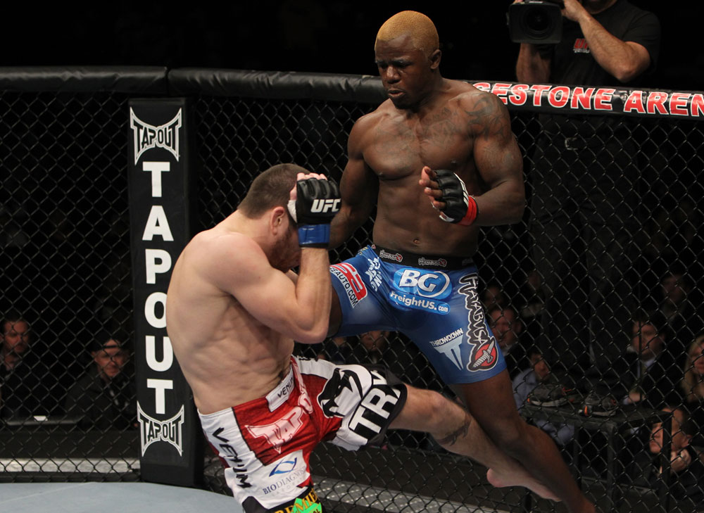 NASHVILLE, TN - JANUARY 20:  (R-L) Melvin Guillard delivers a knee strike against Jim Miller during the UFC on FX event at Bridgestone Arena on January 20, 2012 in Nashville, Tennessee.  (Photo by Josh Hedges/Zuffa LLC/Zuffa LLC via Getty Images)