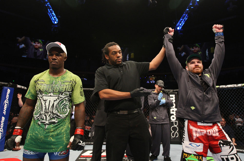 NASHVILLE, TN - JANUARY 20:  Jim Miller (R) celebrates after defeating Melvin Guillard (L) by submission during the UFC on FX event at Bridgestone Arena on January 20, 2012 in Nashville, Tennessee.  (Photo by Josh Hedges/Zuffa LLC/Zuffa LLC via Getty Images)