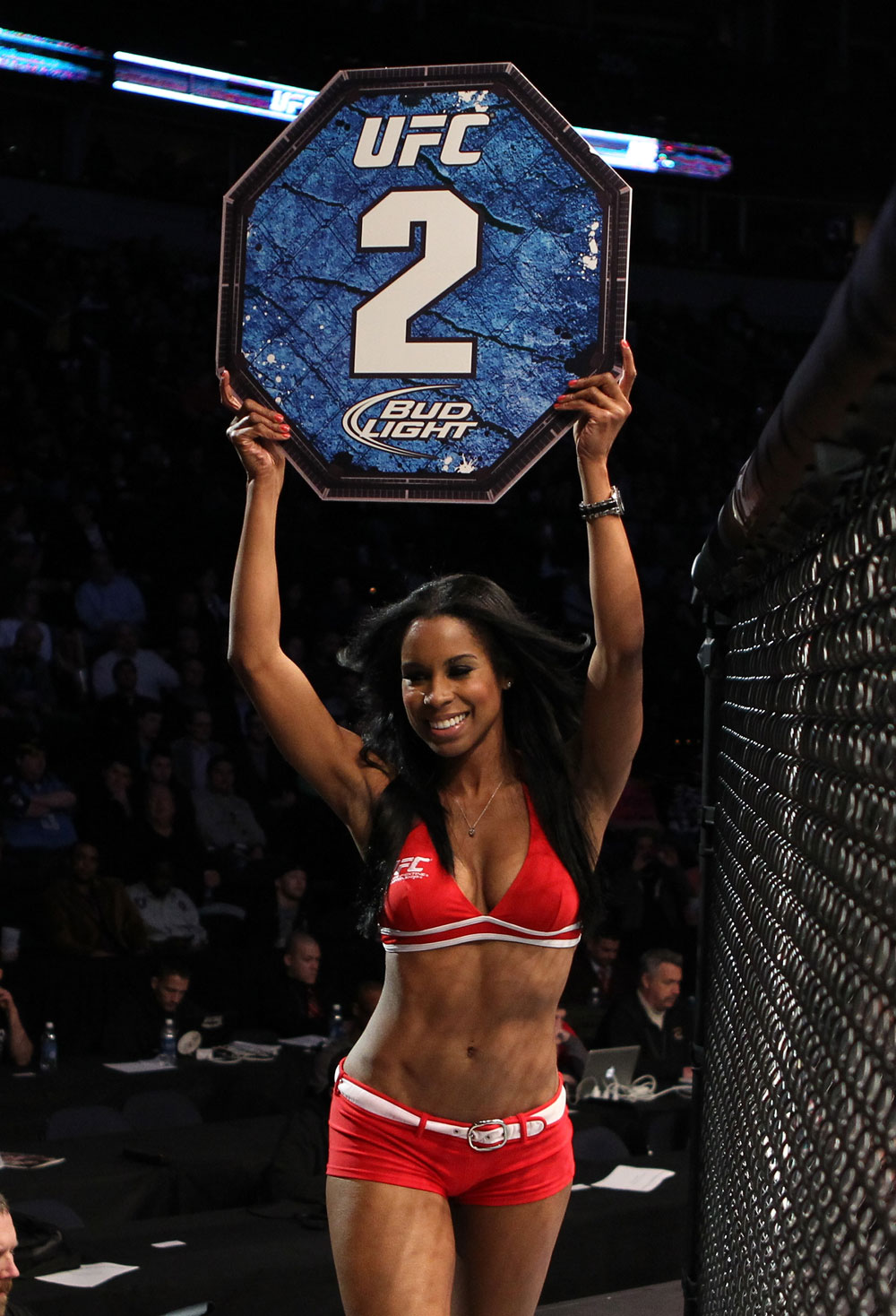 NASHVILLE, TN - JANUARY 20:  UFC Octagon Girl Chandella Powell introduces round two before the Brenneman vs Roberts bout during the UFC on FX event at Bridgestone Arena on January 20, 2012 in Nashville, Tennessee.  (Photo by Josh Hedges/Zuffa LLC/Zuffa LLC via Getty Images)