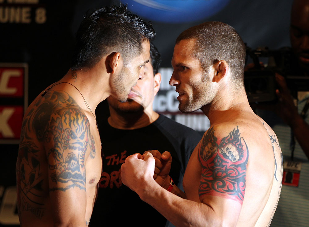 SUNRISE, FL - JUNE 07:   (L-R) Featherweight opponents Leonard Garcia and Matt Grice face off after making weight during the UFC on FX 3 official weigh in at Bank Atlantic Center on June 7, 2012 in Sunrise, Florida.  (Photo by Josh Hedges/Zuffa LLC/Zuffa LLC via Getty Images)