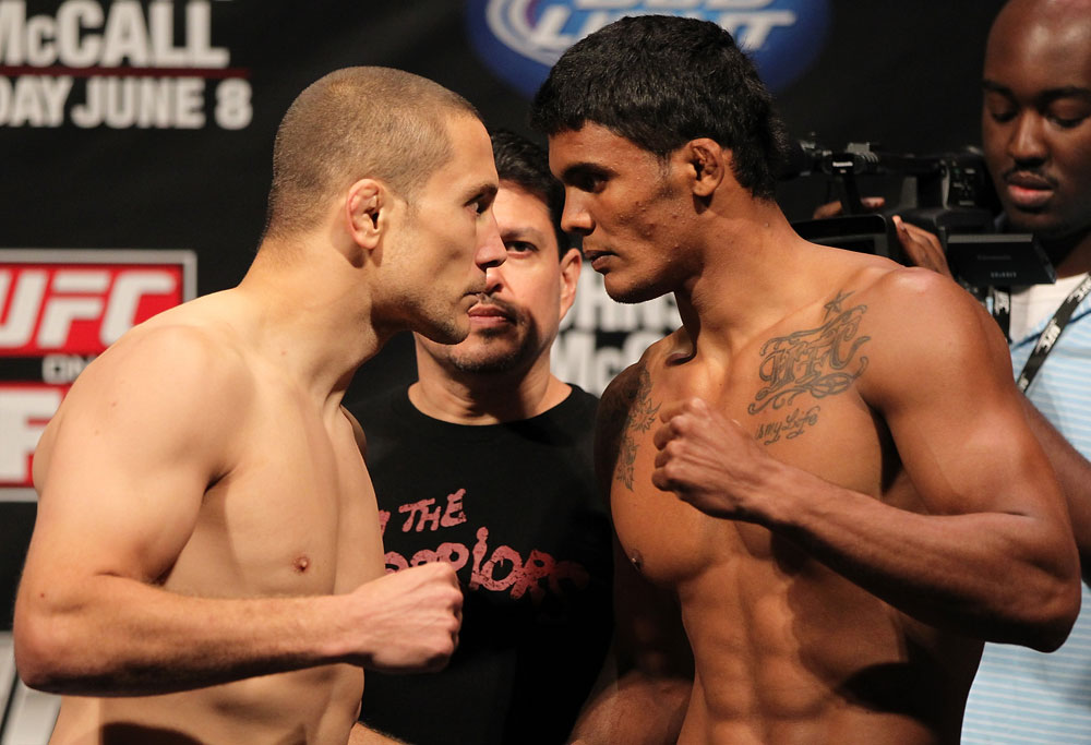 SUNRISE, FL - JUNE 07:   (L-R) Welterweight opponents Mike Pierce and Carlos Eduardo Rocha face off after making weight during the UFC on FX 3 official weigh in at Bank Atlantic Center on June 7, 2012 in Sunrise, Florida.  (Photo by Josh Hedges/Zuffa LLC/Zuffa LLC via Getty Images)
