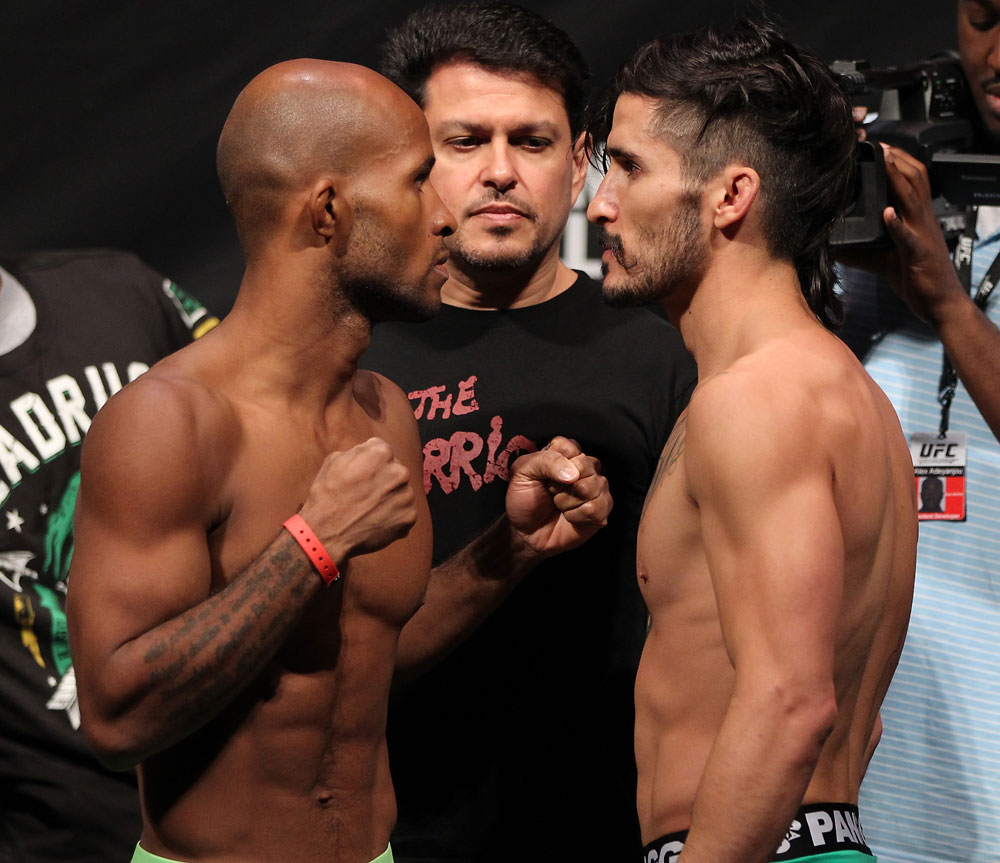 SUNRISE, FL - JUNE 07:   (L-R) Featherweight opponents Demetrious Johnson and Ian McCall face off after making weight during the UFC on FX 3 official weigh in at Bank Atlantic Center on June 7, 2012 in Sunrise, Florida.  (Photo by Josh Hedges/Zuffa LLC/Zuffa LLC via Getty Images)