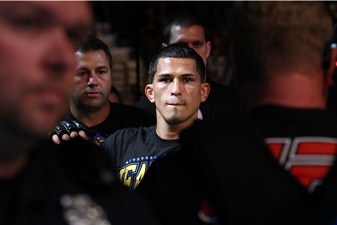 MILWAUKEE, WI - AUGUST 31:  Anthony Pettis enters the arena prior to his fight against Benson Henderson in their UFC lightweight championship bout at BMO Harris Bradley Center on August 31, 2013 in Milwaukee, Wisconsin. (Photo by Ed Mulholland/Zuffa LLC/Zuffa LLC via Getty Images) *** Local Caption *** Anthony Pettis