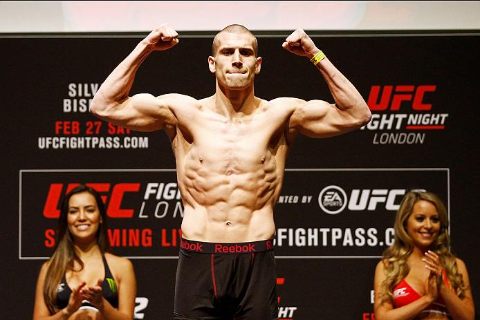 Tom Breese of England stands on the scales on stage during the UFC Fight Night Weigh-in held at at Indigo at The O2 Arena on February 26, 2016 in London, England. Tom Breese of England and Keita 'K-Taro' Keita of Japan will fight tomorrow night in the O2 Arena. (Photo by Dean Mouhtaropoulos/Zuffa LLC)
