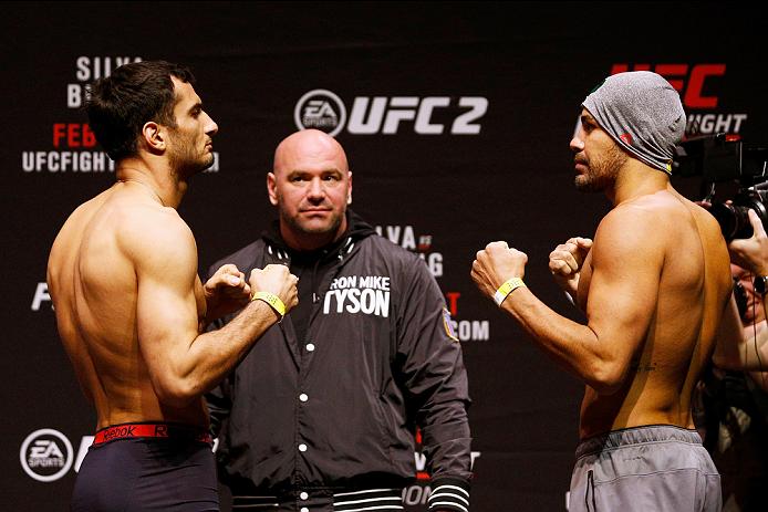 Thales Leites (R) of Brazil and Gegard Mousasi (L) of Iran pose on stage during the UFC Fight Night Weigh-in held at at Indigo at The O2 Arena on February 26, 2016 in London, England. Gegard Mousasi of Iran and Thales Leites of Brazil will fight tomorrow night in the O2 Arena. (Photo by Dean Mouhtaropoulos/Zuffa LLC)
