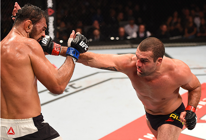 (L-R) Mauricio 'Shogun' Rua of Brazil punches Rogerio Nogueira of Brazil in their light heavyweight bout during UFC 190 on August 1, 2015 in Rio de Janeiro, Brazil. (Photo by Josh Hedges/Zuffa LLC)