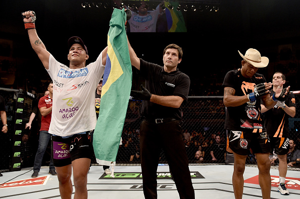 Gilbert Burns of Brazil celebrates after defeating Alex Oliveira in their bout during the UFC Fight Night on March 21, 2015 in Brazil. (Photo by Buda Mendes/Zuffa LLC)