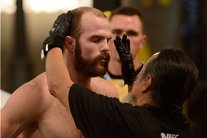 LACHUTE, CANADA - NOVEMBER 14: Team Australia fighter Richard Walsh prepares to enter the Octagon before facing Team Canada fighter Matthew Desroches in their welterweight fight during filming of The Ultimate Fighter Nations television series on November 14, 2013 in Lachute, Quebec, Canada. (Photo by Richard Wolowicz/Zuffa LLC/Zuffa LLC via Getty Images) *** Local Caption *** Richard Walsh