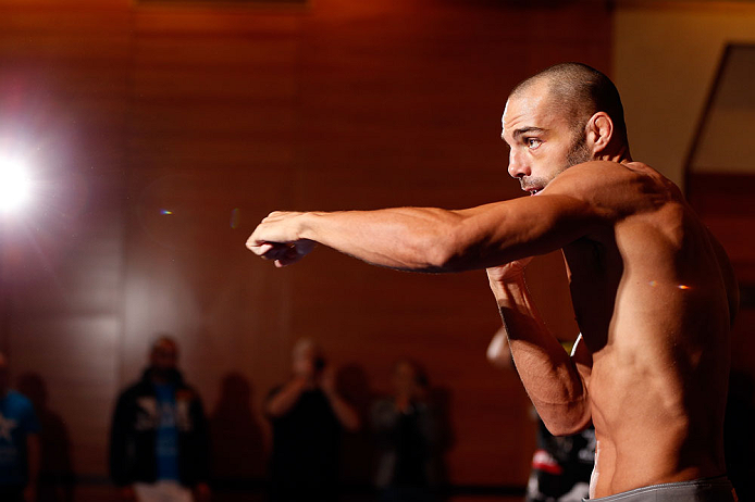 SEATTLE, WA - DECEMBER 05:  Mike Swick works out for fans and media during the UFC on FOX open workouts on December 5, 2012  at the Grand Hyatt Seattle in Seattle, Washington.  (Photo by Josh Hedges/Zuffa LLC/Zuffa LLC via Getty Images)