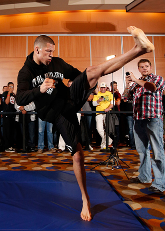 SEATTLE, WA - DECEMBER 05:  Nate Diaz works out for fans and media during the UFC on FOX open workouts on December 5, 2012  at the Grand Hyatt Seattle in Seattle, Washington.  (Photo by Josh Hedges/Zuffa LLC/Zuffa LLC via Getty Images)