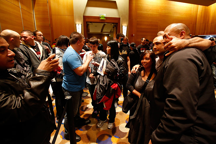 SEATTLE, WA - DECEMBER 05:  BJ Penn poses for photos with fans during the UFC on FOX open workouts on December 5, 2012  at the Grand Hyatt Seattle in Seattle, Washington.  (Photo by Josh Hedges/Zuffa LLC/Zuffa LLC via Getty Images)