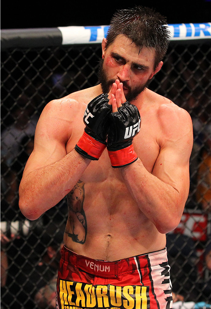 INDIANAPOLIS, IN - AUGUST 28:  Carlos Condit reacts after his TKO victory over Martin Kampmann in their welterweight fight during the UFC on FOX Sports 1 event at Bankers Life Fieldhouse on August 28, 2013 in Indianapolis, Indiana. (Photo by Ed Mulholland/Zuffa LLC/Zuffa LLC via Getty Images)