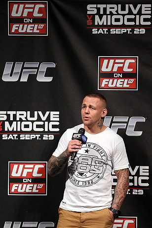 NOTTINGHAM, ENGLAND - SEPTEMBER 28: Ross Pearson interacts with fans during a Q&A session before the UFC on Fuel TV weigh in at Capital FM Arena on September 28, 2012 in Nottingham, England. (Photo by Josh Hedges/Zuffa LLC/Zuffa LLC via Getty Images)