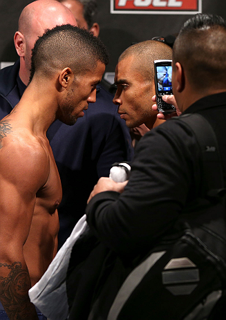 NOTTINGHAM, ENGLAND - SEPTEMBER 28: (L-R) Opponents Jason Young and Robbie Peralta face off during the UFC on Fuel TV weigh in at Capital FM Arena on September 28, 2012 in Nottingham, England. (Photo by Josh Hedges/Zuffa LLC/Zuffa LLC via Getty Images)
