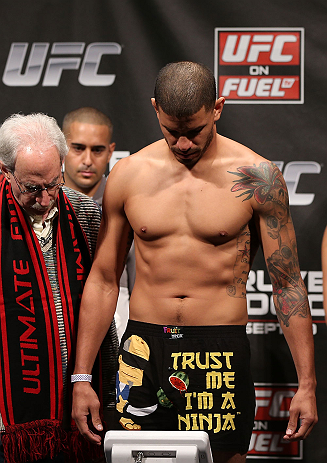 NOTTINGHAM, ENGLAND - SEPTEMBER 28: (L-R) DaMarques Johnson weighs in during the UFC on Fuel TV weigh in at Capital FM Arena on September 28, 2012 in Nottingham, England. (Photo by Josh Hedges/Zuffa LLC/Zuffa LLC via Getty Images)