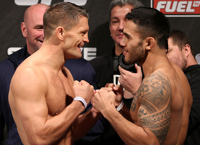 NOTTINGHAM, ENGLAND - SEPTEMBER 28: (L-R) Opponents Tom Watson and Brad Tavares face off during the UFC on Fuel TV weigh in at Capital FM Arena on September 28, 2012 in Nottingham, England. (Photo by Josh Hedges/Zuffa LLC/Zuffa LLC via Getty Images)