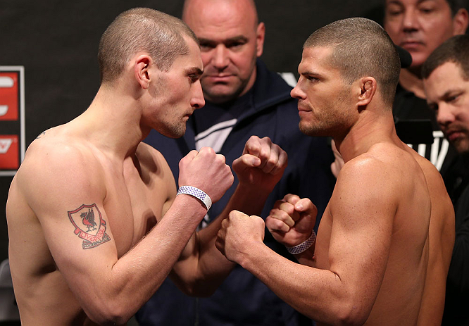 NOTTINGHAM, ENGLAND - SEPTEMBER 28: (L-R) Opponents Paul Sass and Matt Wiman face off during the UFC on Fuel TV weigh in at Capital FM Arena on September 28, 2012 in Nottingham, England. (Photo by Josh Hedges/Zuffa LLC/Zuffa LLC via Getty Images)