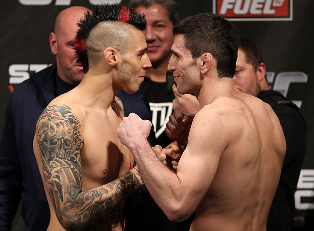 NOTTINGHAM, ENGLAND - SEPTEMBER 28: (L-R) Opponents Dan Hardy and Amir Sadollah face off during the UFC on Fuel TV weigh in at Capital FM Arena on September 28, 2012 in Nottingham, England. (Photo by Josh Hedges/Zuffa LLC/Zuffa LLC via Getty Images)