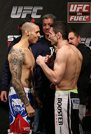 NOTTINGHAM, ENGLAND - SEPTEMBER 28: (L-R) Opponents Dan Hardy and Amir Sadollah face off during the UFC on Fuel TV weigh in at Capital FM Arena on September 28, 2012 in Nottingham, England. (Photo by Josh Hedges/Zuffa LLC/Zuffa LLC via Getty Images)