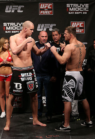 NOTTINGHAM, ENGLAND - SEPTEMBER 28: (L-R) Opponents Stefan Struve and Stipe Miocic face off during the UFC on Fuel TV weigh in at Capital FM Arena on September 28, 2012 in Nottingham, England. (Photo by Josh Hedges/Zuffa LLC/Zuffa LLC via Getty Images)