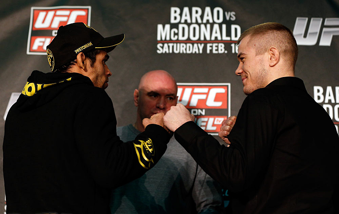 LONDON, ENGLAND - FEBRUARY 13: (L-R) Opponents Renan Barao and Michael McDonald face off during a UFC press conference on February 13, 2013 at Hooks Gym in London, England. (Photo by Josh Hedges/Zuffa LLC/Zuffa LLC via Getty Images)