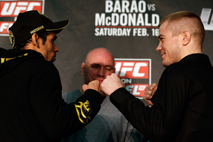 LONDON, ENGLAND - FEBRUARY 13: (L-R) Opponents Renan Barao and Michael McDonald face off during a UFC press conference on February 13, 2013 at Hooks Gym in London, England. (Photo by Josh Hedges/Zuffa LLC/Zuffa LLC via Getty Images)