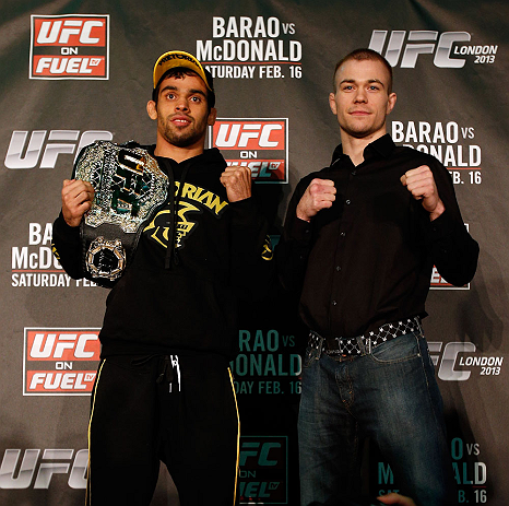 LONDON, ENGLAND - FEBRUARY 13: (L-R) Opponents Renan Barao and Michael McDonald pose for photos during a UFC press conference on February 13, 2013 at Hooks Gym in London, England. (Photo by Josh Hedges/Zuffa LLC/Zuffa LLC via Getty Images)