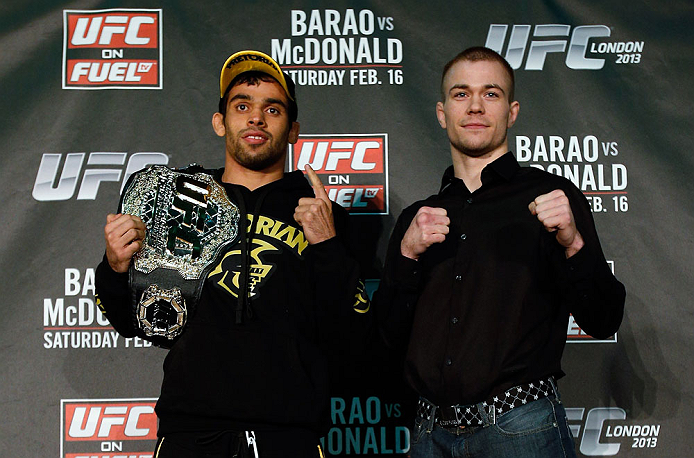 LONDON, ENGLAND - FEBRUARY 13: (L-R) Opponents Renan Barao and Michael McDonald pose for photos during a UFC press conference on February 13, 2013 at Hooks Gym in London, England. (Photo by Josh Hedges/Zuffa LLC/Zuffa LLC via Getty Images)