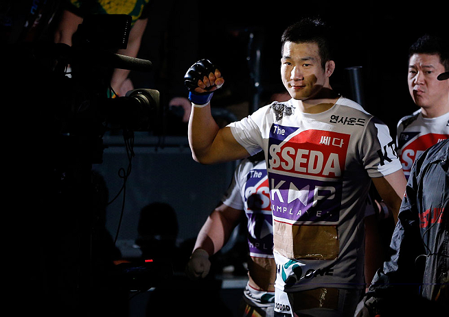 SAITAMA, JAPAN - MARCH 03: Hyun Gyu Lim enters the arena before his welterweight fight against Marcelo Guimaraes during the UFC on FUEL TV event at Saitama Super Arena on March 3, 2013 in Saitama, Japan. (Photo by Josh Hedges/Zuffa LLC/Zuffa LLC via Getty Images)