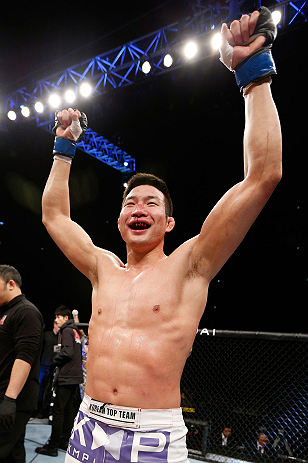 SAITAMA, JAPAN - MARCH 03:  Hyun Gyu Lim reacts after knocking out Marcelo Guimaraes in their welterweight fight during the UFC on FUEL TV event at Saitama Super Arena on March 3, 2013 in Saitama, Japan.  (Photo by Josh Hedges/Zuffa LLC/Zuffa LLC via Getty Images)
