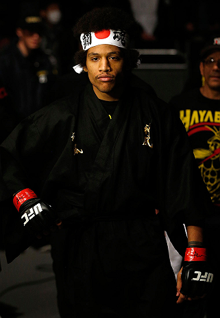 SAITAMA, JAPAN - MARCH 03:  Alex Caceres enters the arena before his bantamweight fight against Kyung Ho Kang during the UFC on FUEL TV event at Saitama Super Arena on March 3, 2013 in Saitama, Japan.  (Photo by Josh Hedges/Zuffa LLC/Zuffa LLC via Getty Images)