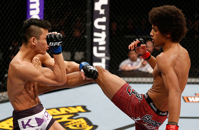 SAITAMA, JAPAN - MARCH 03:  (R-L) Alex Caceres kicks Kyung Ho Kang in their bantamweight fight during the UFC on FUEL TV event at Saitama Super Arena on March 3, 2013 in Saitama, Japan.  (Photo by Josh Hedges/Zuffa LLC/Zuffa LLC via Getty Images)