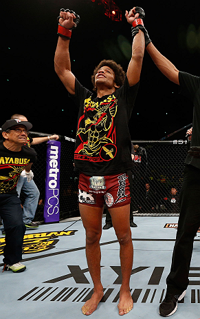 SAITAMA, JAPAN - MARCH 03:  Alex Caceres reacts after defeating Kyung Ho Kang in their bantamweight fight during the UFC on FUEL TV event at Saitama Super Arena on March 3, 2013 in Saitama, Japan.  (Photo by Josh Hedges/Zuffa LLC/Zuffa LLC via Getty Images)