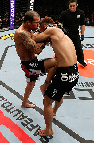SAITAMA, JAPAN - MARCH 03:  (L-R) Cristiano Marcello knees Kazuki Tokudome in their lightweight fight during the UFC on FUEL TV event at Saitama Super Arena on March 3, 2013 in Saitama, Japan.  (Photo by Josh Hedges/Zuffa LLC/Zuffa LLC via Getty Images)