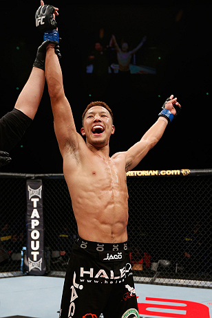 SAITAMA, JAPAN - MARCH 03:  Kazuki Tokudome reacts after defeating Cristiano Marcello in their lightweight fight during the UFC on FUEL TV event at Saitama Super Arena on March 3, 2013 in Saitama, Japan.  (Photo by Josh Hedges/Zuffa LLC/Zuffa LLC via Getty Images)