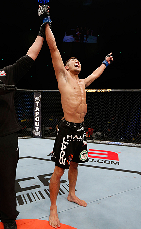 SAITAMA, JAPAN - MARCH 03:  Kazuki Tokudome reacts after defeating Cristiano Marcello in their lightweight fight during the UFC on FUEL TV event at Saitama Super Arena on March 3, 2013 in Saitama, Japan.  (Photo by Josh Hedges/Zuffa LLC/Zuffa LLC via Getty Images)