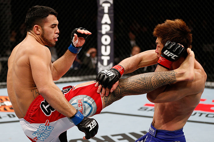 SAITAMA, JAPAN - MARCH 03:  (L-R) Brad Tavares kicks Riki Fukuda in their middleweight fight during the UFC on FUEL TV event at Saitama Super Arena on March 3, 2013 in Saitama, Japan.  (Photo by Josh Hedges/Zuffa LLC/Zuffa LLC via Getty Images)