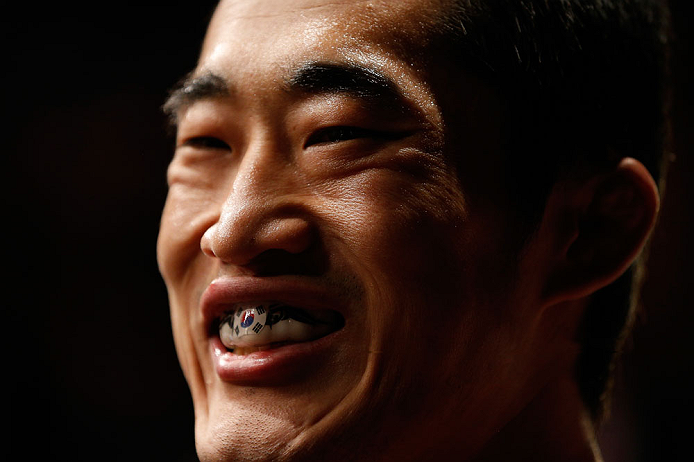 SAITAMA, JAPAN - MARCH 03:  Dong Hyun Kim prepares to enter the Octagon before his welterweight fight against Siyar Bahadurzada during the UFC on FUEL TV event at Saitama Super Arena on March 3, 2013 in Saitama, Japan.  (Photo by Josh Hedges/Zuffa LLC/Zuffa LLC via Getty Images)