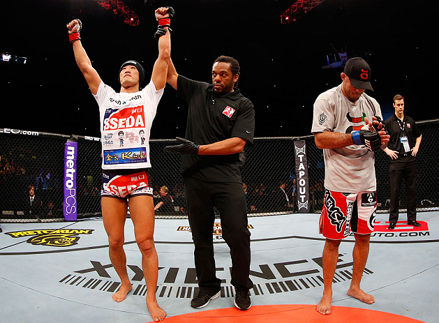 SAITAMA, JAPAN - MARCH 03:  Dong Hyun Kim (L) reacts after defeating Siyar Bahadurzada in their welterweight fight during the UFC on FUEL TV event at Saitama Super Arena on March 3, 2013 in Saitama, Japan.  (Photo by Josh Hedges/Zuffa LLC/Zuffa LLC via Getty Images)