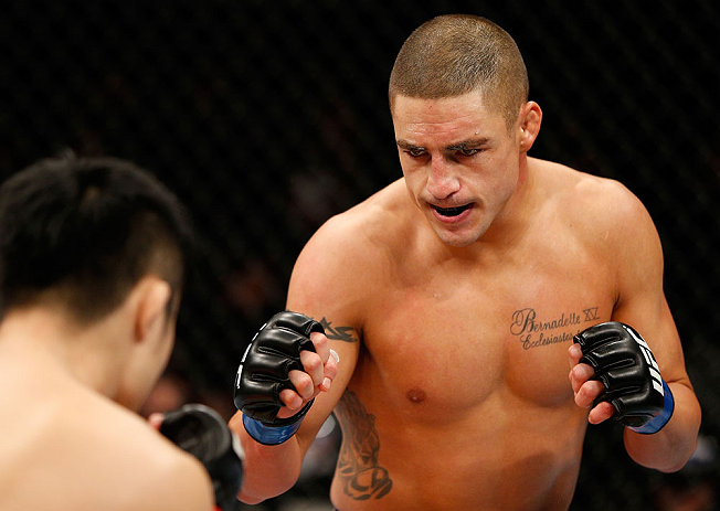 SAITAMA, JAPAN - MARCH 03:  (R-L) Diego Sanchez squares off with Takanori Gomi in their lightweight fight during the UFC on FUEL TV event at Saitama Super Arena on March 3, 2013 in Saitama, Japan.  (Photo by Josh Hedges/Zuffa LLC/Zuffa LLC via Getty Images)