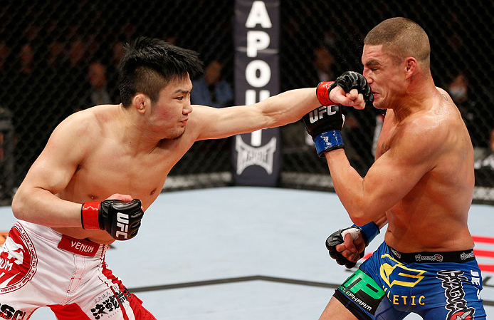 SAITAMA, JAPAN - MARCH 03:  (L-R) Takanori Gomi punches Diego Sanchez in their lightweight fight during the UFC on FUEL TV event at Saitama Super Arena on March 3, 2013 in Saitama, Japan.  (Photo by Josh Hedges/Zuffa LLC/Zuffa LLC via Getty Images)