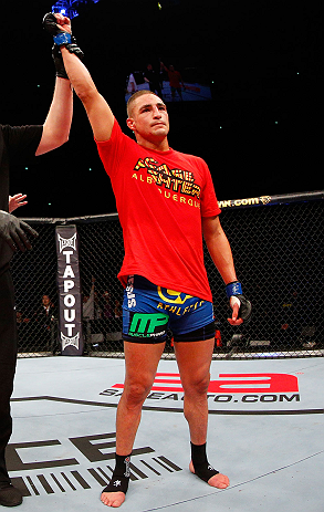 SAITAMA, JAPAN - MARCH 03:  Diego Sanchez reacts after defeating Takanori Gomi in their lightweight fight during the UFC on FUEL TV event at Saitama Super Arena on March 3, 2013 in Saitama, Japan.  (Photo by Josh Hedges/Zuffa LLC/Zuffa LLC via Getty Images)