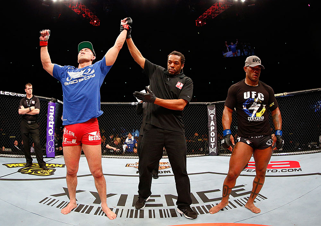 SAITAMA, JAPAN - MARCH 03:  Yushin Okami (L) reacts after defeating Hector Lombard in their middleweight fight during the UFC on FUEL TV event at Saitama Super Arena on March 3, 2013 in Saitama, Japan.  (Photo by Josh Hedges/Zuffa LLC/Zuffa LLC via Getty Images)