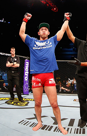 SAITAMA, JAPAN - MARCH 03:  Yushin Okami reacts after defeating Hector Lombard in their middleweight fight during the UFC on FUEL TV event at Saitama Super Arena on March 3, 2013 in Saitama, Japan.  (Photo by Josh Hedges/Zuffa LLC/Zuffa LLC via Getty Images)
