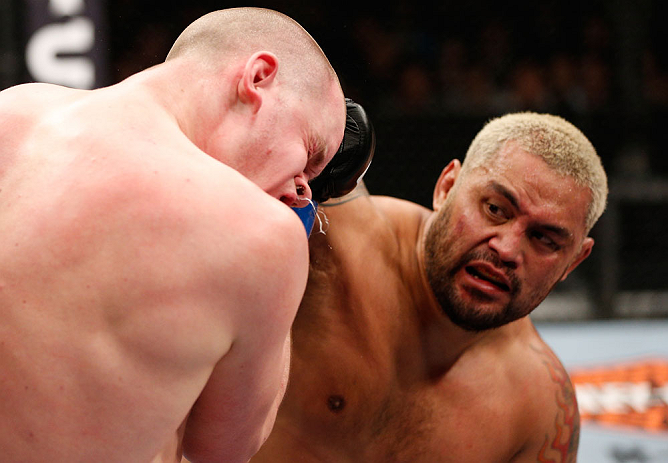 SAITAMA, JAPAN - MARCH 03:  (R-L) Mark Hunt punches Stefan Struve in their heavyweight fight during the UFC on FUEL TV event at Saitama Super Arena on March 3, 2013 in Saitama, Japan.  (Photo by Josh Hedges/Zuffa LLC/Zuffa LLC via Getty Images)